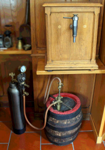 Early gas-pressure lager font using wooden barrel, at Menabrea's museum