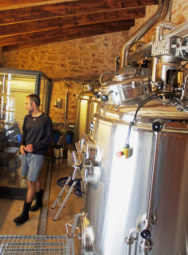 The brewhouse at the Beer Lovers brewery in Alcuida, with the lauter tun/whirlpool in the foreground