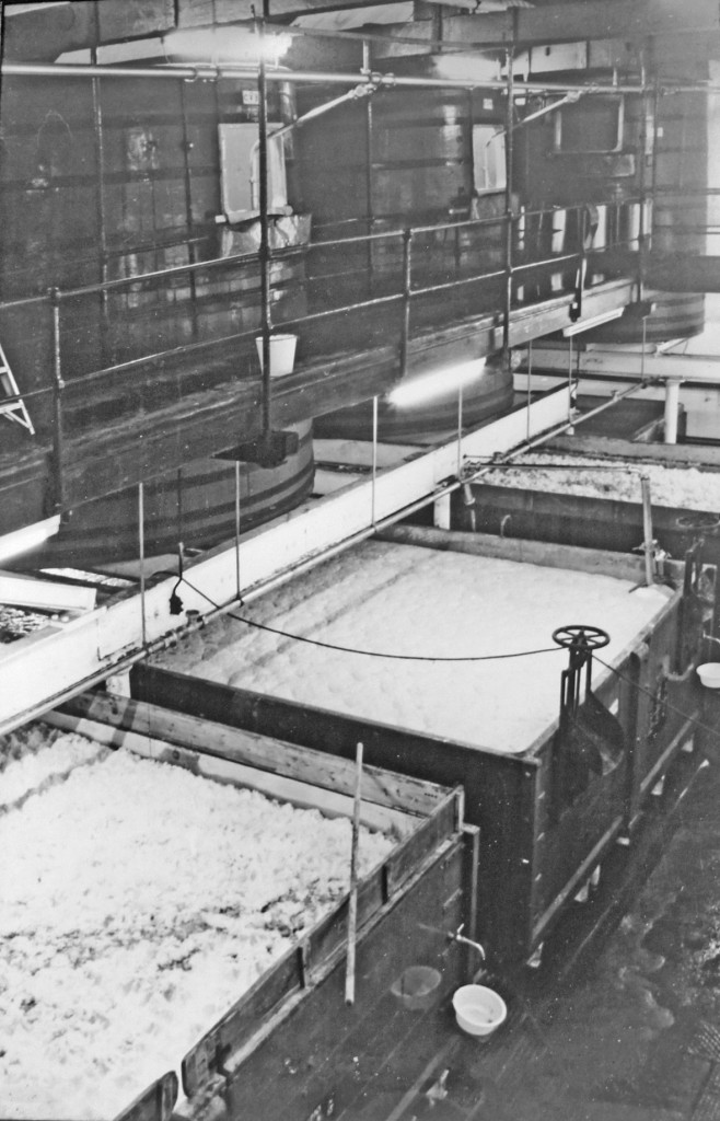 The fermenting room at Fuller's Griffin brewery about 1970, showing the "dropping" system in use: fermentation would be started in the upper rounds, and after a day or two the wort would be dropped into the shallower squares below to finish fermentation.